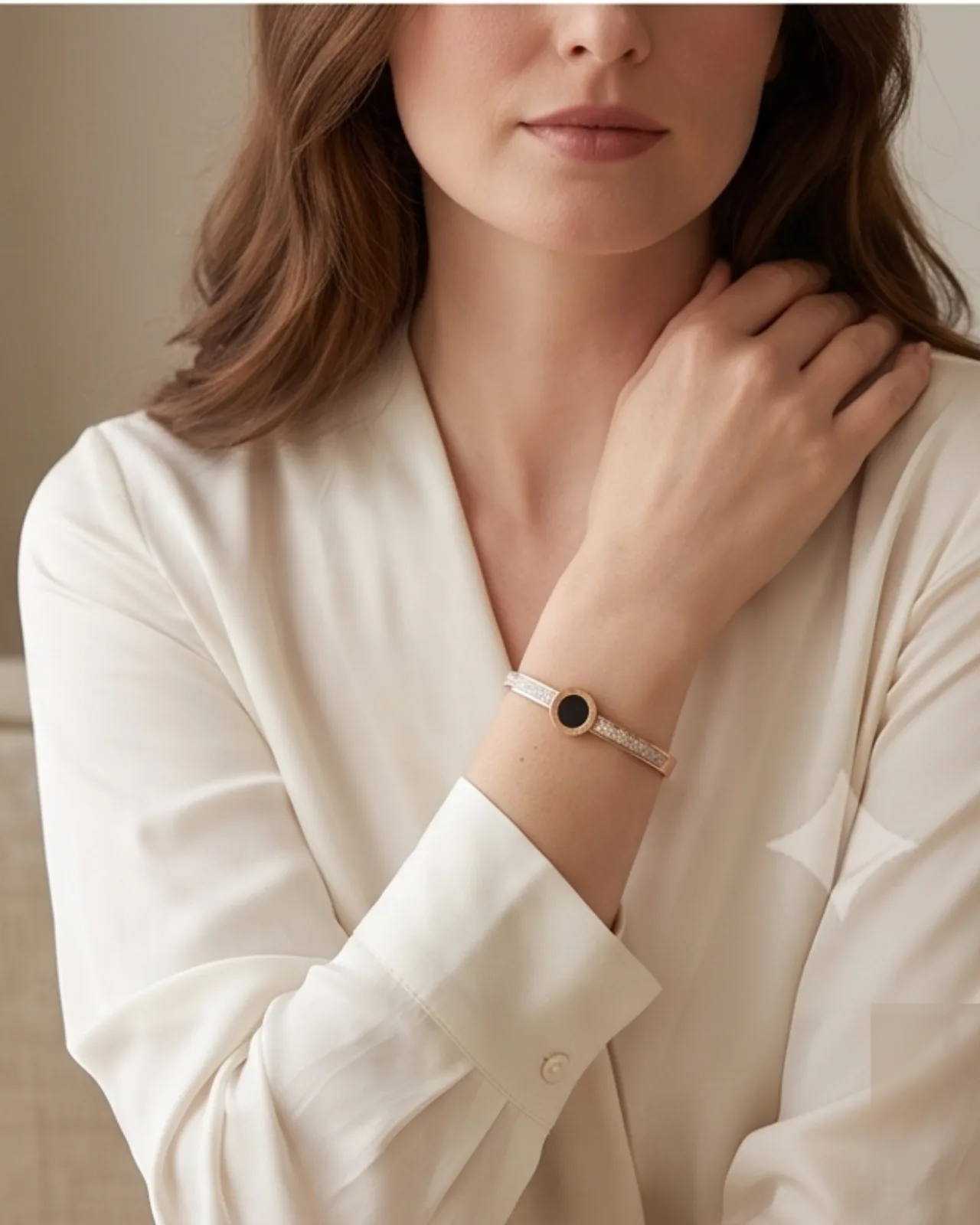 Solène Roman Cuff bracelet resting elegantly on a draped silk surface