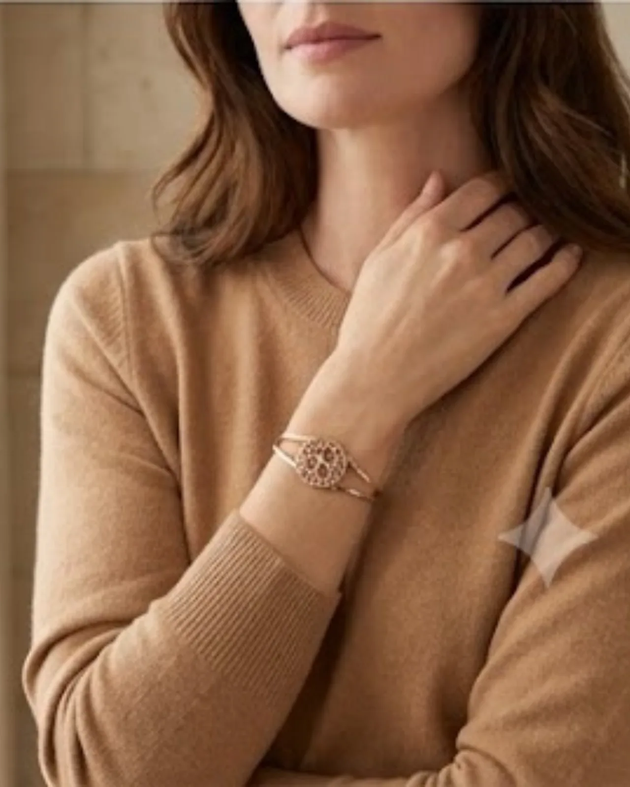 Arène Tree Cuff bracelet elegantly placed on soft draped fabric